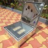 Kuzhupilly Solarkocher mit Vollkornbrot.JPG